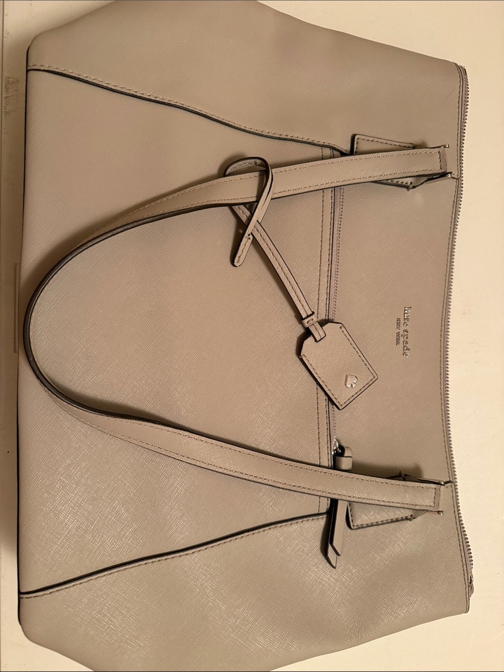 kate spade grey leather tote with luggage tag